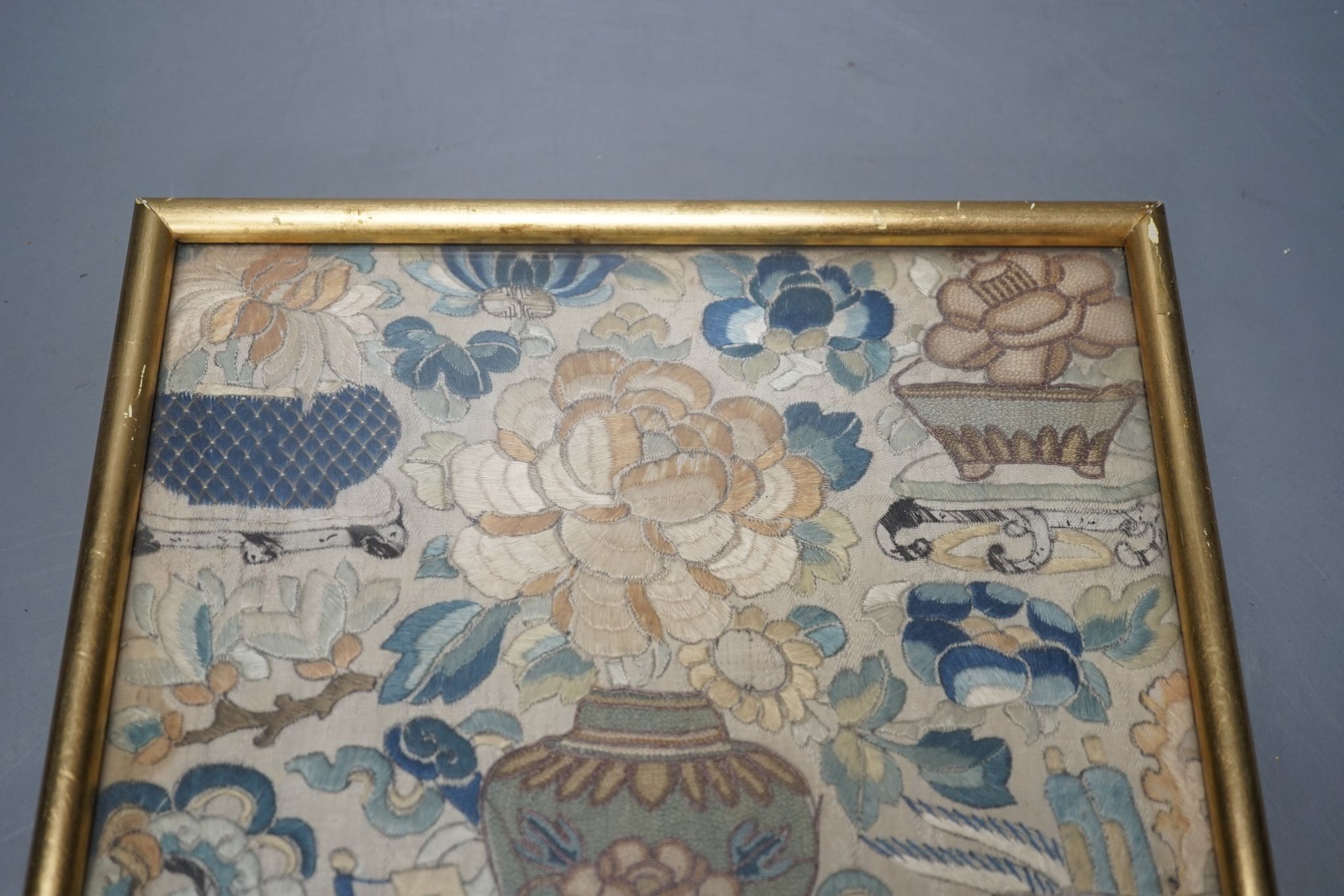 A late 19th century Chinese embroidered panel, worked with a vase of flowers, framed, 28 x 22cm